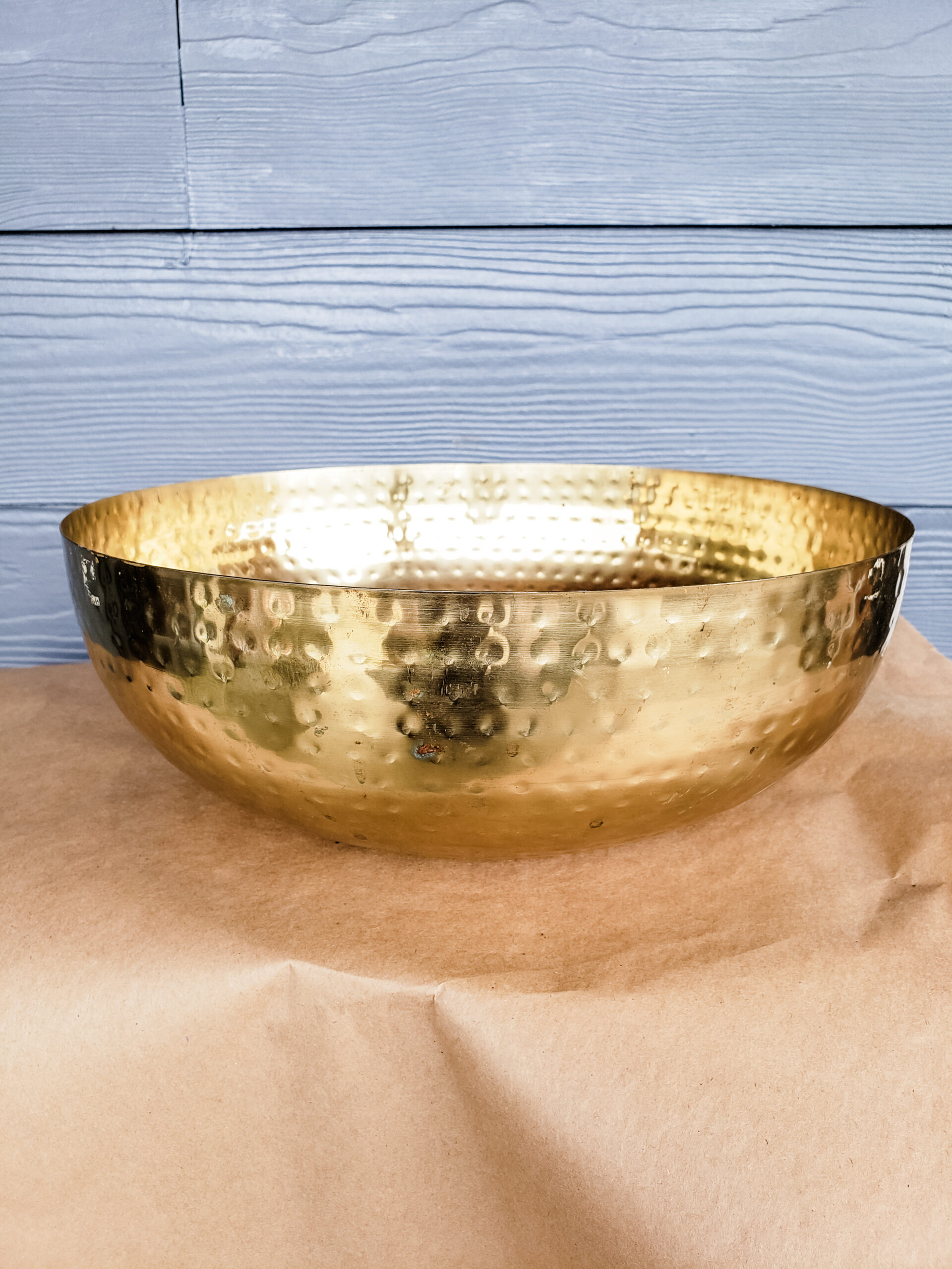 large copper bowl that is 10 inches wide